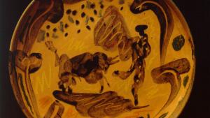Plato cerámico con dibujos de una corrida de toros