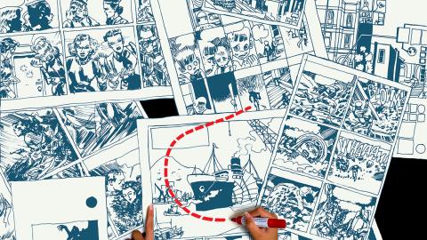 Unas manos pintan en las páginas de un cómic