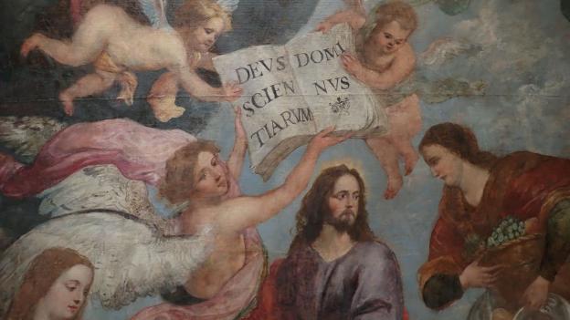 imagen de un lienzo con un personaje central representando a Cristo rodeado de ángeles