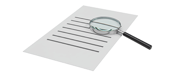 Imagen de lupa sobre un documento