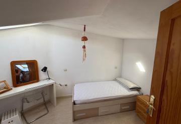 Habitación abuardillada