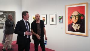 La Comunidad de Madrid regresa a La Movida con una exposición en la Sala Alcalá 31 que incluye obras de Ouka Leele, Ceesepe o Costus El consejero De Paco Serrano en la inauguración de La Movida