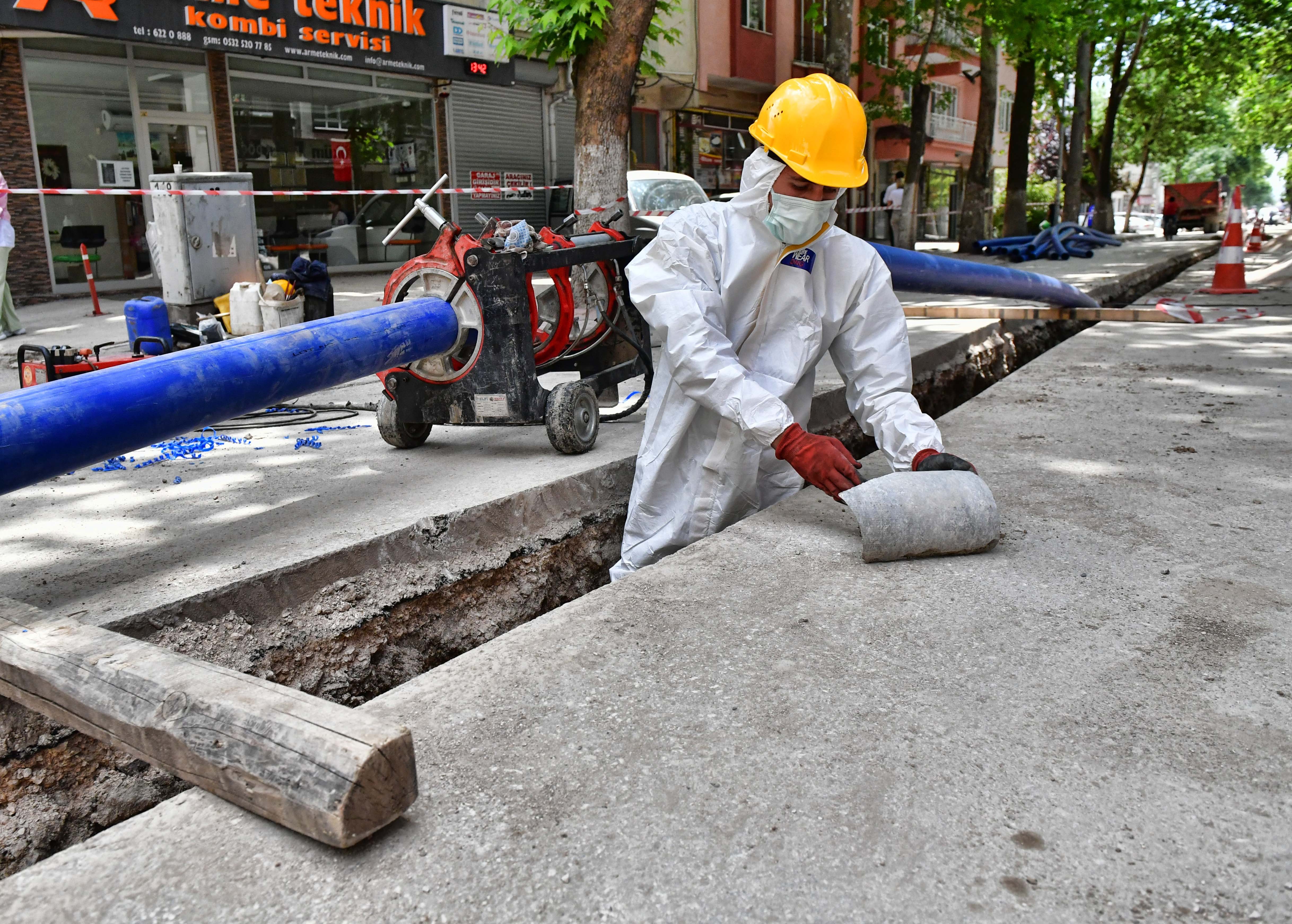 Worker handling asbestos