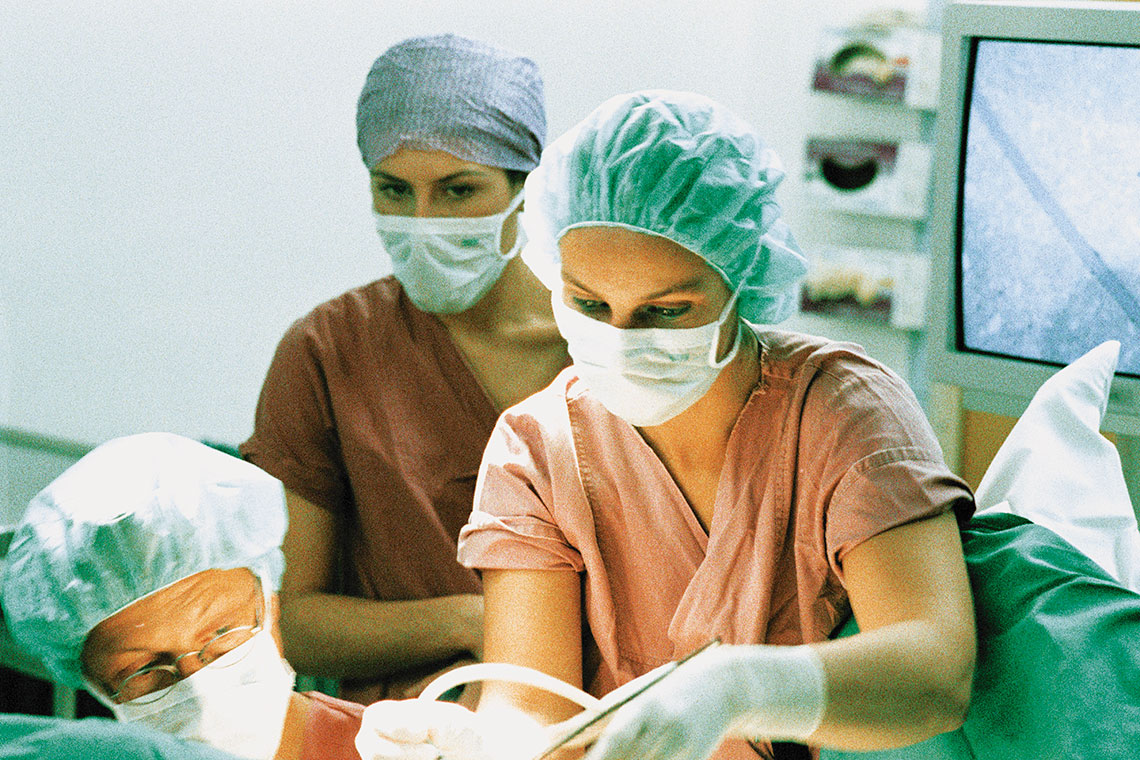 Medical personnel operating