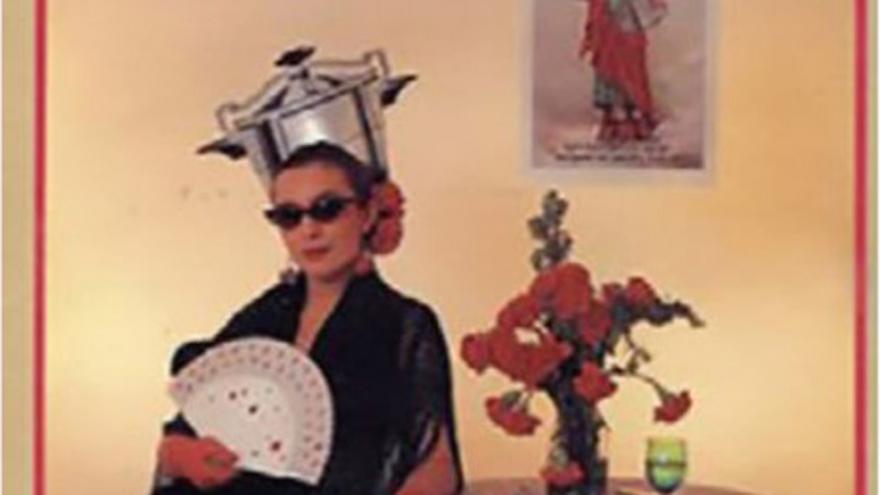 Magazine cover with a photograph of a woman wearing a pressure cooker and a fan