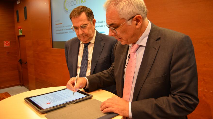 The counselor signing on a tablet