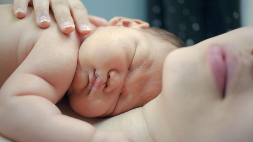 Baby on his mother's chest