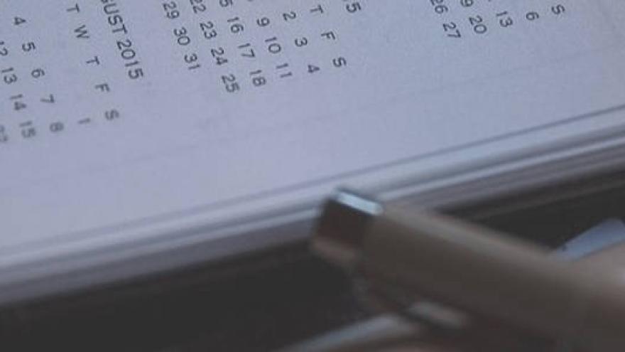 Agenda y bolígrafo