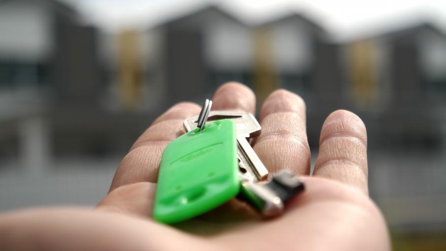 Image of a hand with keys