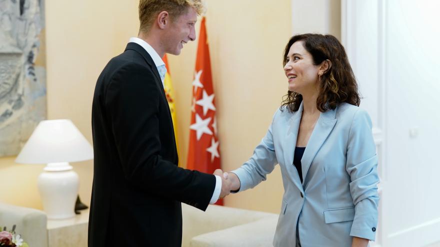 The president greets the tennis player