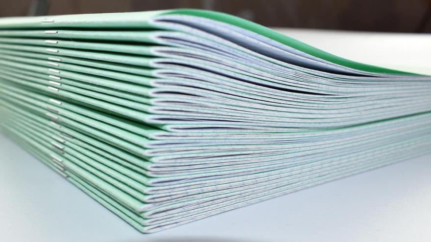 stacked notebooks