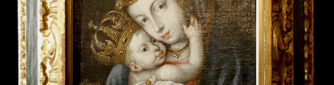 Oil on canvas depicting a crowned Virgin with child framed in a decorated frame