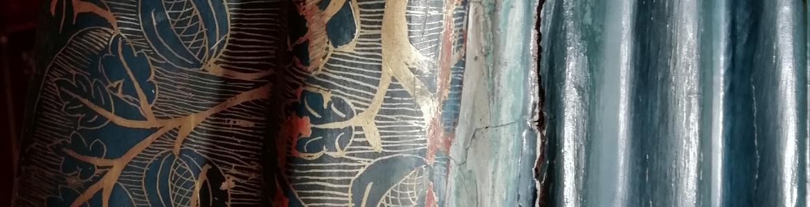 Detail of a polychrome sculpture in poor condition