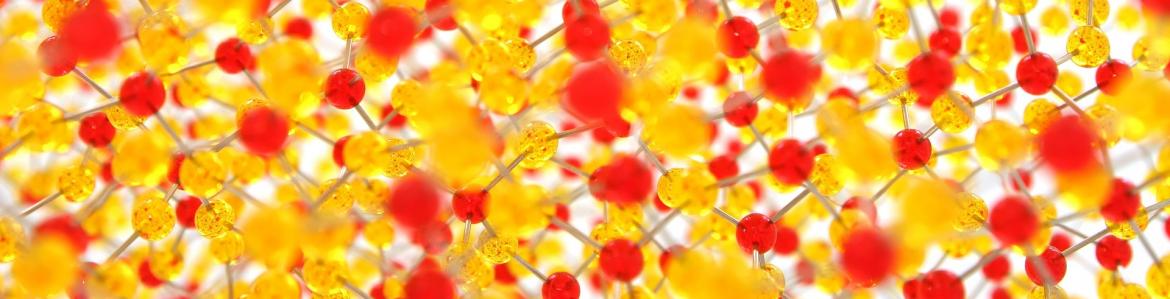 Malla de enlaces químicos de moléculas de color amarillo, naranja y rojo