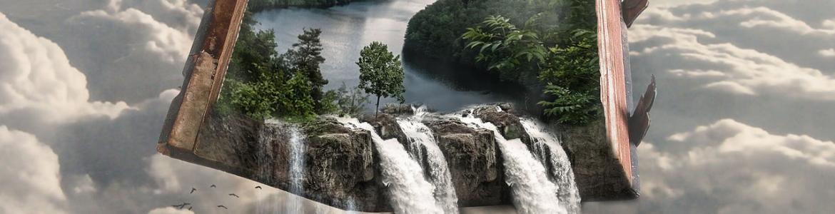 Libro abierto con un paisaje con agua a doble página del que cae agua en forma de cascada