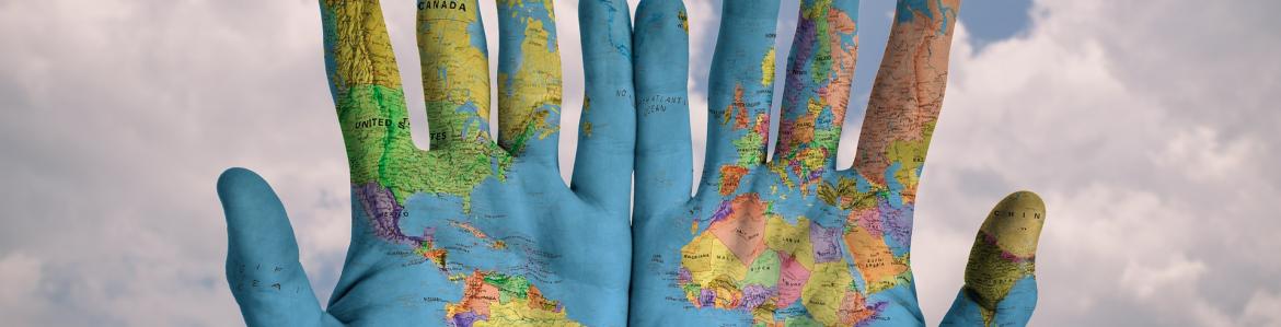 World map on open hands