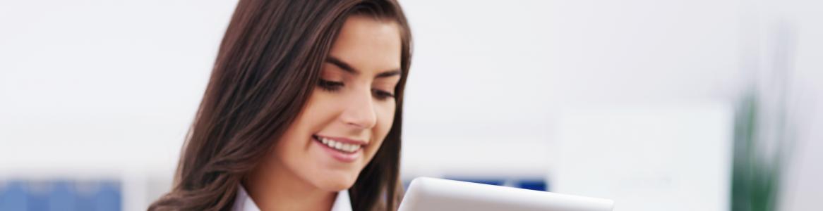 woman with tablet in hand