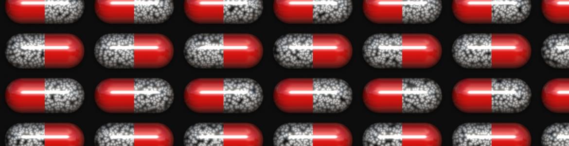 Cápsulas bicolores (rojas y negras) simbolizando antibióticos