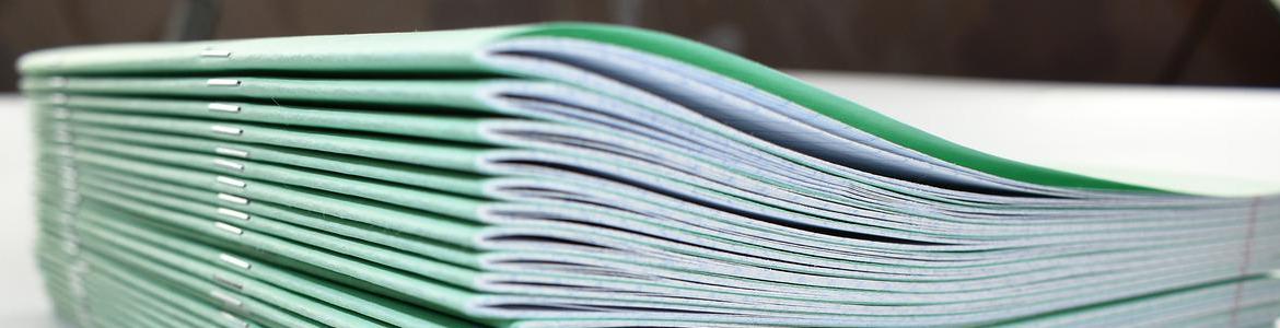 stacked notebooks