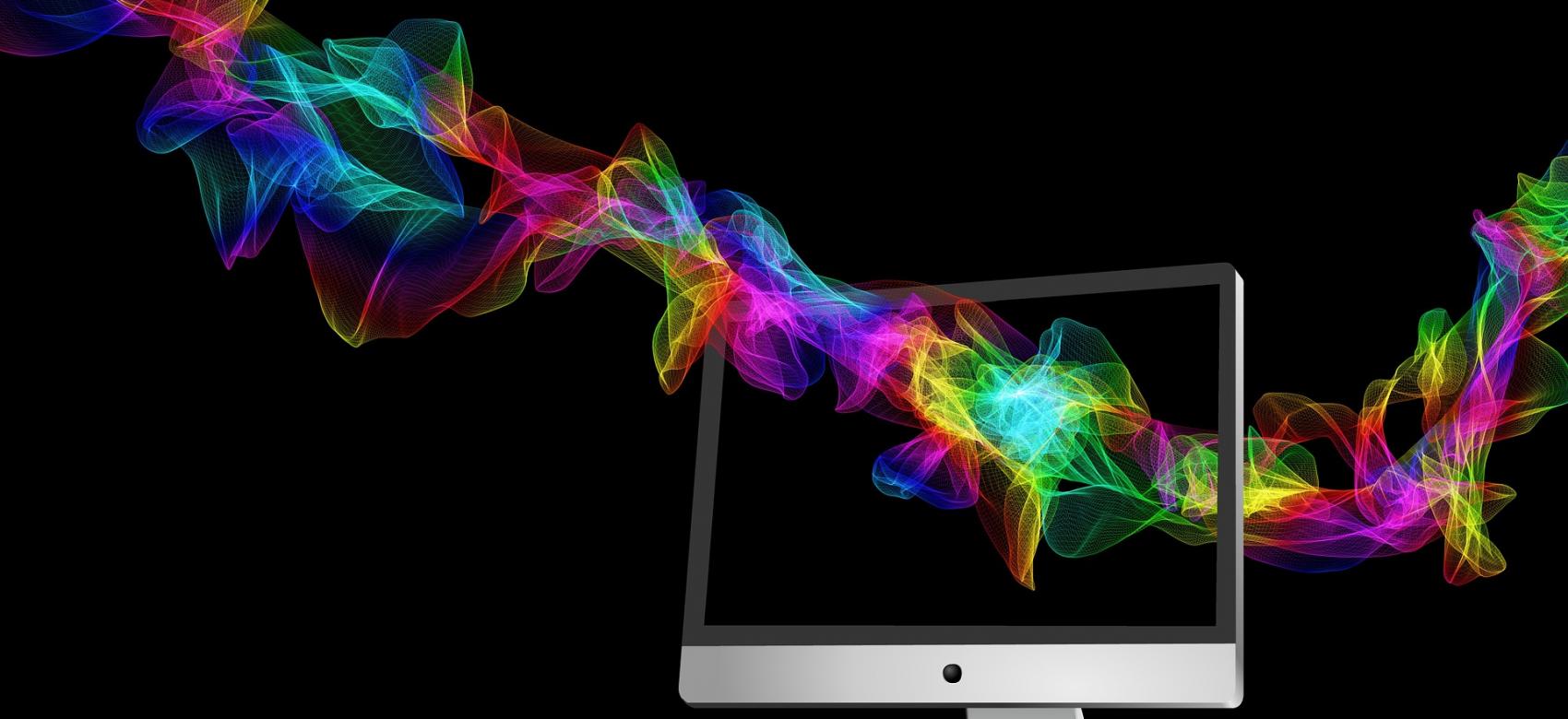 Computer screen traversed by colorful spiral
