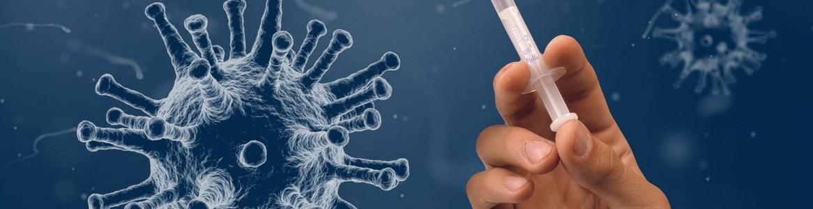 dibujo de un virus coronavirus y una mano con una jeringuilla