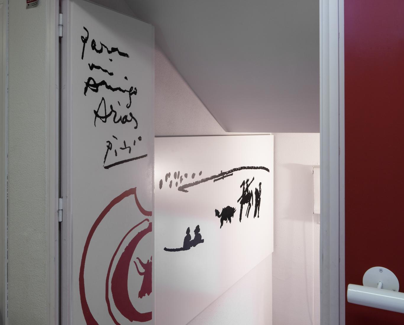 White door with some black drawings