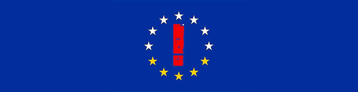 Signo de admiración enmarcado por las doce estrellas de la bandera de la UE