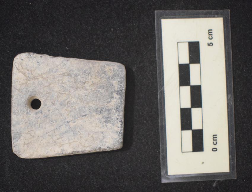 Image of Fragment of an archer's bracelet from the Chalcolithic period at Yacimiento El Colegio in Valdemoro