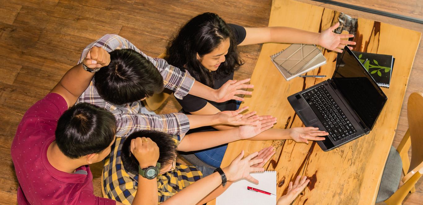 students with a laptop