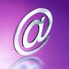 email: slanted at sign on pink background